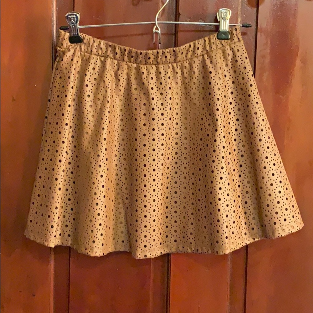Cute leather type skirt. With tags never worn!